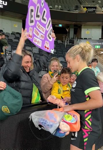 Ellie Carpenter Signs Boots for Fans at Matildas Match