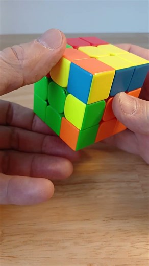 How to flip three corners and two edges of a 3x3 Rubik's Cube at the same time