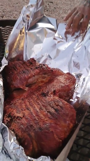 Grilling Deer ham on my homemade ugly Barrel smoker