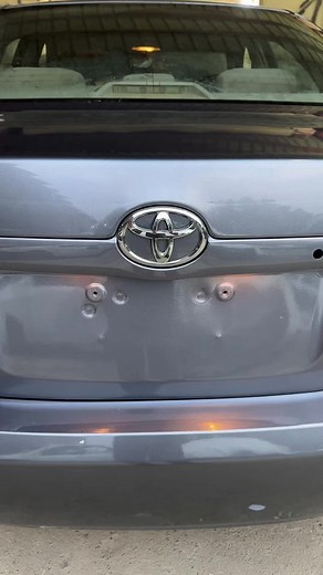 Damage Assessment of a Dark Gray Toyota Sedan