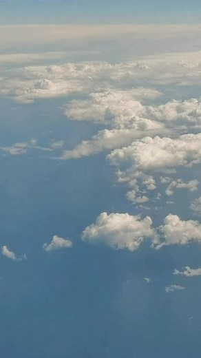 Breathtaking Aerial Views of Clouds and Blue Sky