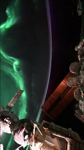 Captured from the International Space Station: Earth's aurora transitions into orbital dawn.