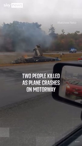 Two killed as plane crashes onto motorway