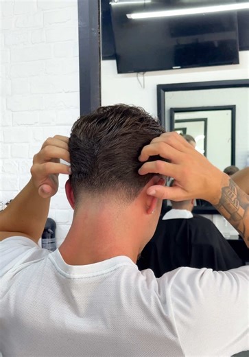 Summer Haircut Trends: Slick Rick with Ear Flick