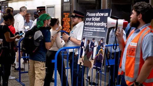 LIRR checking tickets before boarding during Penn Station evening rush