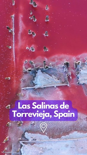 Located in Spain, the bright pink lakes known as Las Salinas de Torrevieja will blow your mind! The rare pink hue of the Torrevieja lagoon, which almost looks unnatural, tends to be caused by pigments from the Halobacterium bacteria that thrive in intense saline conditions. The hue is also caused by an alga called Dunadiella Salina, which is responsible for the lake’s deep red colour. | The World Bucket List | Facebook
