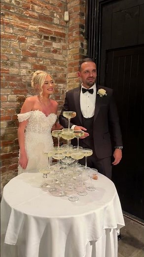 Drink Tower Falls as Groom Accidentally Kicks Table - 1542608