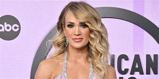 Carrie Underwood Shuts Down the AMA Red Carpet in Low-Cut Sparkling Dress
