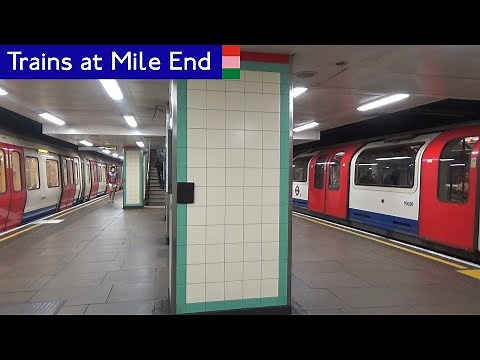 London Underground: Central, H&C and District line trains at Mile End