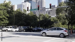 Downtown Atlanta as cars drive during rush hour Stock Video