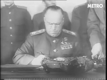 Nazi Field Marshal Wilhelm Keitel surrenders to Marshal Georgy Zhukov of the USSR in Berlin