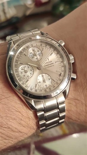 Omega Speedmaster Triple Date. 2000s mechanical mastery.