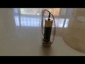 AA battery,copper wire,magnet,Simplest Motor made with a magnet, Best Science Fair Project!