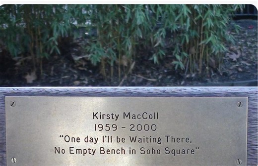 An empty bench in Soho Square