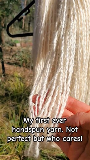 Spinning with a drop spindle.