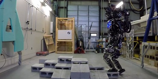 This MIT robot competing at the DARPA Challenge can use a drill, open doors and even see
