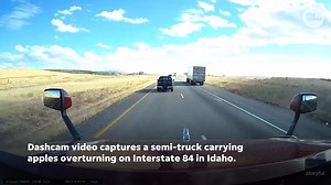 1K views · 12 reactions | Dashcam footage captured the dramatic moment when a semi-truck overturned along the interstate in Idaho. | USA TODAY Video | Facebook