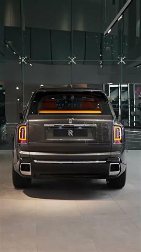 The Rolls-Royce Cullinan in beautiful Gunmetal with a Silver Bonnet, matching the perfect