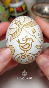 The ultimate reveal on my newest pysanka! Turning a simple egg into delicate lace using vinegar etching method. Which detail is your favorite? Let me know in the comments! 👇 #pysanky #artist #handpainted #eastereggs #lineart #fineart | Pysanka Art