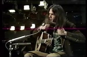 1971: Neil Young on the harmonica.