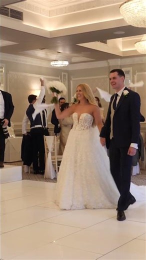 Bride & Groom Enter the Wedding Breakfast