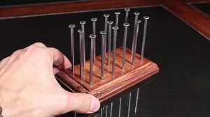 5.2M views · 17K reactions | The challenge is simple .. just balance 14 nails on one nail head ... at the same time! | The King of Random | Facebook