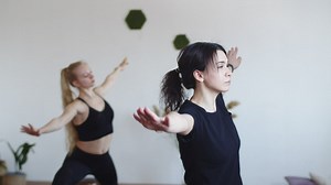 Two women in the middle of a pilates class - Free Stock Video