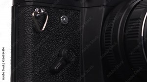 Single-lens reflex camera. A close-up of a manual self-timer mounted on a camera. Camera intended for taking pictures on black-and-white and color films