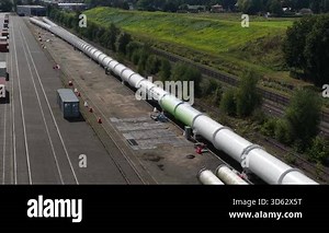 Hyperloop concept, vacuum train, pneumatic tube technology, high speed futuristic transport, research, development, test facilities. Aerial views.