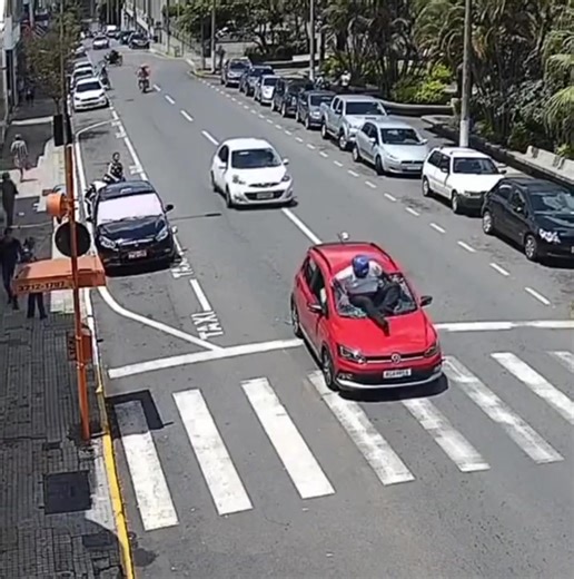 2.4K views · 17 reactions | Watch ️: Speeding motor rider runs into a stationary car at a stop light sending him crushing over into the windscreen. #TopRadio | Top Radio | Facebook