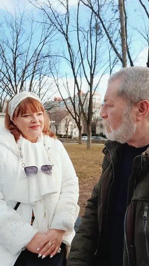 Outdoor Conversation: Man and Woman on a Bench