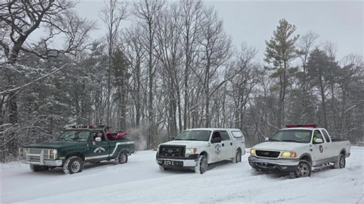 Crews trying to rescue 13 people who slid off snowy north Georgia mountain in cars