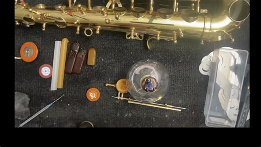 Artificial Intelligence is not taking over the Woodwind Repair Industry anytime soon. Can you imagine the machine that would be built to take apart a saxophone, remove an old pad, shellac and add the new pad and reassemble the key to the saxophone? How much would that machine cost to make? Who would service that machine? Okay, why not just learn to repair woodwind instruments this New Year 2026? Start as a novice and then work toward advanced. This video is a shortened instruction video by Duke