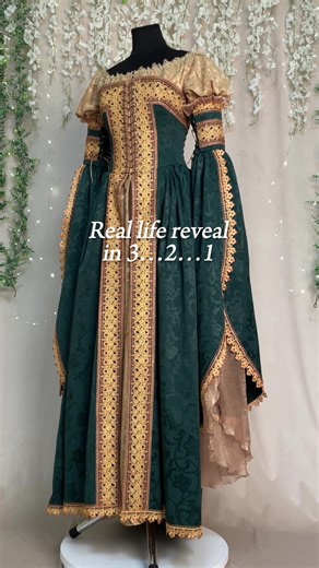 Our Italian Renaissance courtesan dress went viral for its unique blend of history and fantasy: inspired by the bold beauty of Italian courtesans, it captivates with its signature emerald-and-gold palette, lacing, and detachable flowing sleeves.