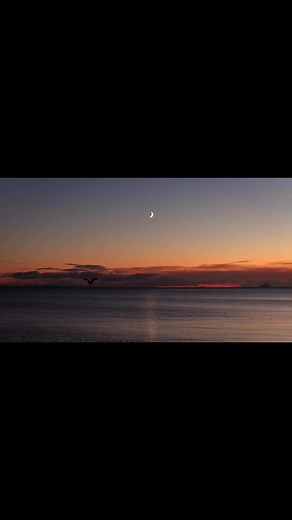 The Crescent moon over Saltcoats harbour, the mighty Arran rising above Ardrossan Harbour and Clyde Marina, and a dive boats combing the seabed for razorfish #Ardrossan #Saltcoats #Arran #Ayrshire #NorthAyrshire #Scotland | Peter Ribbeck