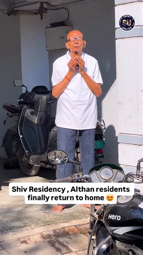 Surat updates on Instagram: "Relief for residents of Shiv Residence in Althan as the building’s structural stability report has come back positive. With the clearance, visible relief and smiles were seen on residents’ faces. Many expressed gratitude by offering prayers before re-entering their homes, touching the threshold as part of the traditional griha pravesh. #suratcity #surat"
