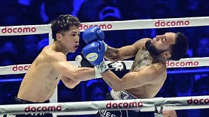 Inoue rallies to retain junior featherweight title