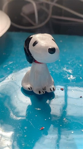 Making snoopy out of clay