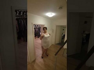 elegant crossdresser, relaxing after a long day at the office