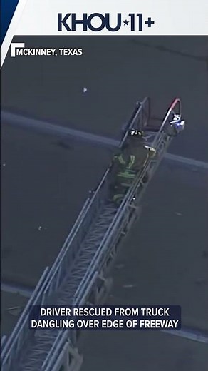 Driver rescued from truck dangling off side of highway
