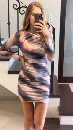 Fall into fashion with our Elsia Long Sleeve Mini Dress! 🍂 Perfect for wine and dine vibes, this dress boasts a round neckline, stylish ruched sides, and a flattering bodycon fit. Elevate your autumn wardrobe with Dolly Girl Fashions' latest drop! | Dolly Girl Fashion