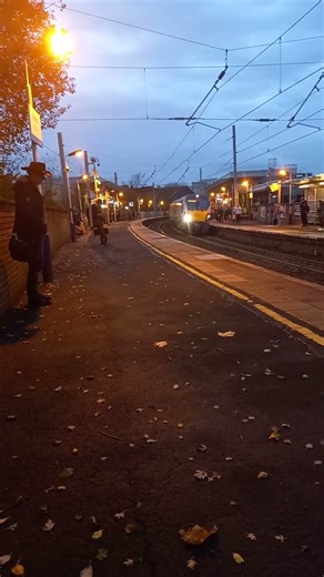 repainted class 334 enters Partick for Edinburgh Waverley