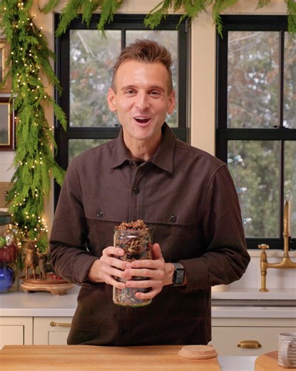 This homemade granola recipe is packed with oats, nuts, seeds, and warm spices, all toasted until golden and crisp. A perfect healthy breakfast or snack. INGREDIENTS - 2 cups old-fashioned rolled oats - 1 1/2 cups raw pecan halves - 1 cup raw almonds - 3/4 cup raw pumpkin seeds - 1 tsp ground cinnamon - 1 tsp ground cardamom - 1/2 tsp ground ginger - 1 tsp kosher salt - 1/3 cup virgin coconut oil - 1/3 cup honey - 1/3 cup maple syrup - 3/4 cup unsweetened dried blueberries - 1/3 cup hemp hearts