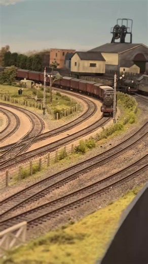 Watch a Long Train Followed by a Short Train on Model Railway