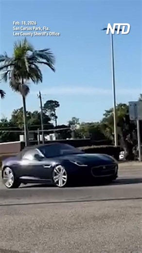 The Lee County Sheriff’s office in Florida posted a video showing a sports car crashing into the rear of a school bus in Florida on Feb. 18. The driver’s condition is unknown. | NTD Television