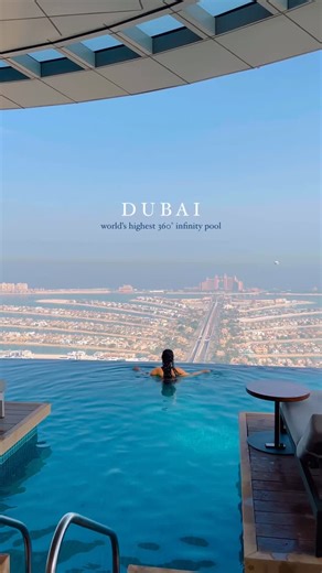 Aurélie | travel & fashion creator on Instagram: "@aureliestory Is this the most beautiful pool in the world? 😍 This isn’t a dream, it’s the world’s highest 360° infinity pool! Palm Jumeirah on one side, Burj Al Arab on the other. Chill beats, insane views and pure luxury ✨ If this isn’t on your bucket list yet… it should be 📍 Aura Sky Pool, Dubai, UAE"