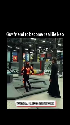 Lucky Clips on Instagram: "The post features a 2022 LADbible video of an anonymous stunt performer, dubbed "real-life Neo," recreating Matrix fight scenes through acrobatic dodges, flips, and improvised weapons in urban and gym settings, emphasizing fluid, gravity-defying movements. With 63,500 likes and 7.5 million views in two days, it underscores The Matrix's enduring appeal, as the 1999 film's wire-fu style continues inspiring viral content 26 years later amid resurgences in sci-fi nostalgia