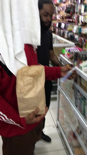 Elephant Steals Woman's Hat in Store Encounter