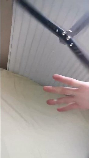 aerial to chadder (slow motion) (balisong/butterfly knife tricks)