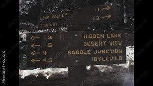 State Park Trail Directions 1970 - Signs indicate destination direction and distance for hikers in Mount San Jacinto State Park, near Palm Springs, California, in 1970.
